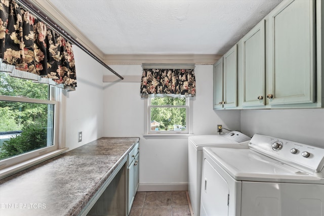 976 Lone Rd, Pioneer, TN 37847 - laundry area with cabinet space, washing machine and dryer, and a textured ceiling