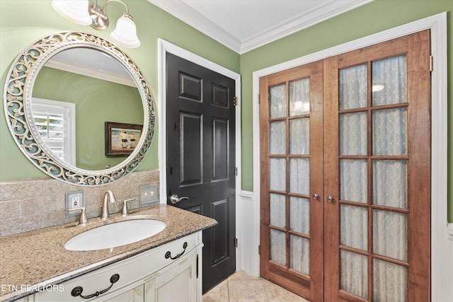 976 Lone Rd, Pioneer, TN 37847 - bathroom with french doors, vanity, wainscoting, crown molding, and tile patterned flooring