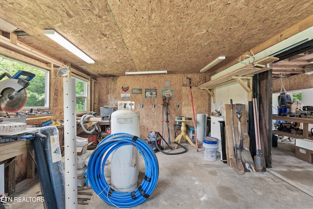976 Lone Rd, Pioneer, TN 37847 - miscellaneous room with a workshop area and unfinished concrete floors