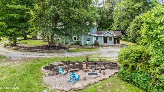 976 Lone Rd, Pioneer, TN 37847 - view of grassy yard with an outdoor fire pit