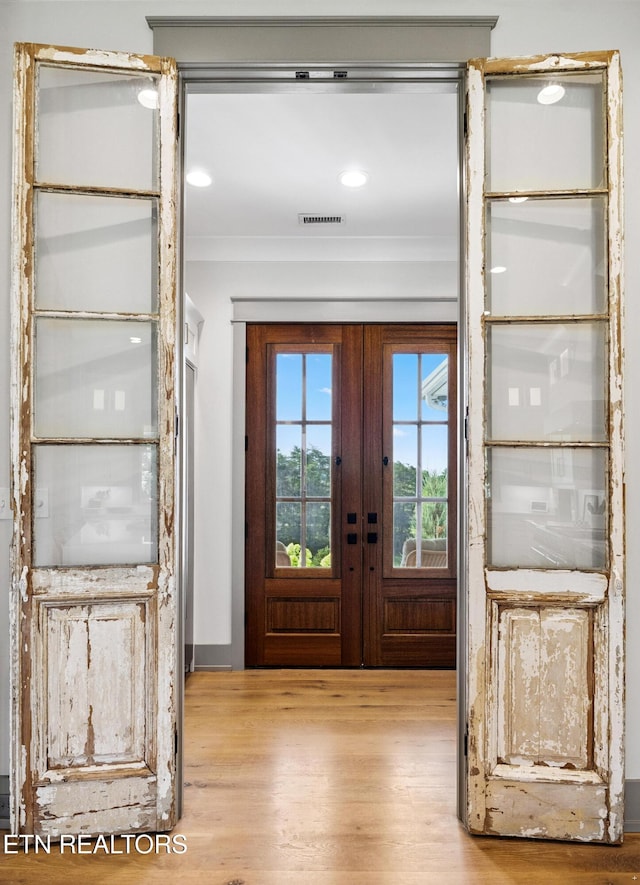 1014 High Springs Rd, Knoxville, TN 37932 - entryway with wood finished floors, ornamental molding, and french doors