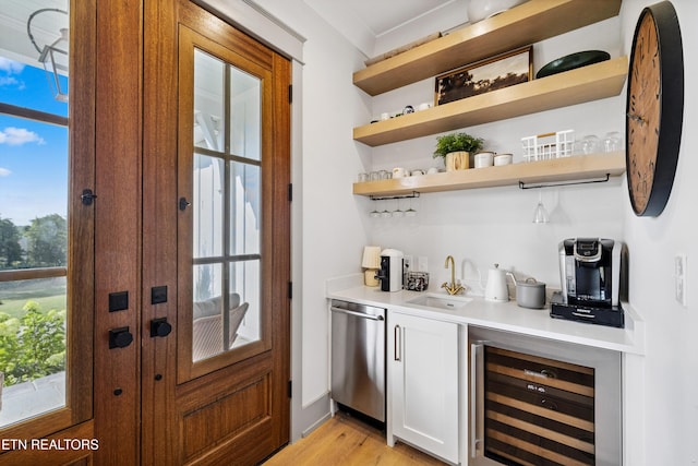 1014 High Springs Rd, Knoxville, TN 37932 - indoor wet bar with wine cooler, dishwasher, light wood finished floors, and plenty of natural light