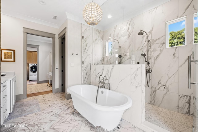 1014 High Springs Rd, Knoxville, TN 37932 - bathroom featuring washer / dryer, a marble finish shower, a soaking tub, vanity, and recessed lighting