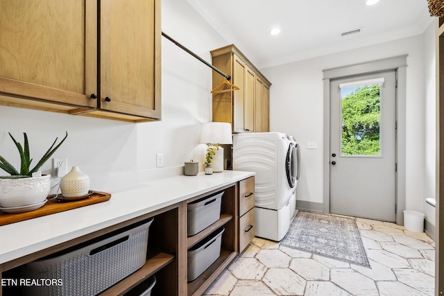 1014 High Springs Rd, Knoxville, TN 37932 - washroom featuring cabinet space, light stone finish flooring, recessed lighting, and washer and clothes dryer
