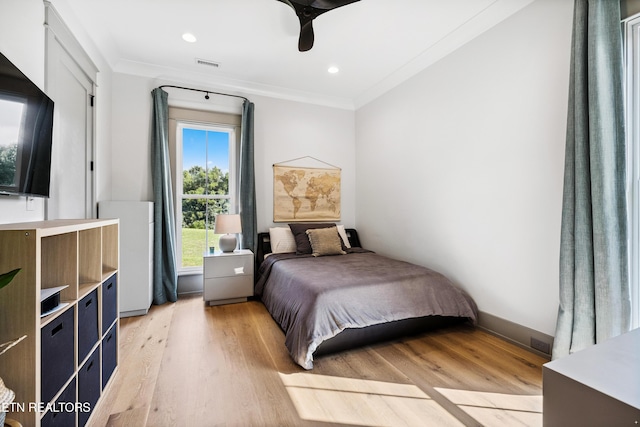 1014 High Springs Rd, Knoxville, TN 37932 - bedroom featuring light wood-type flooring, ornamental molding, recessed lighting, and a ceiling fan