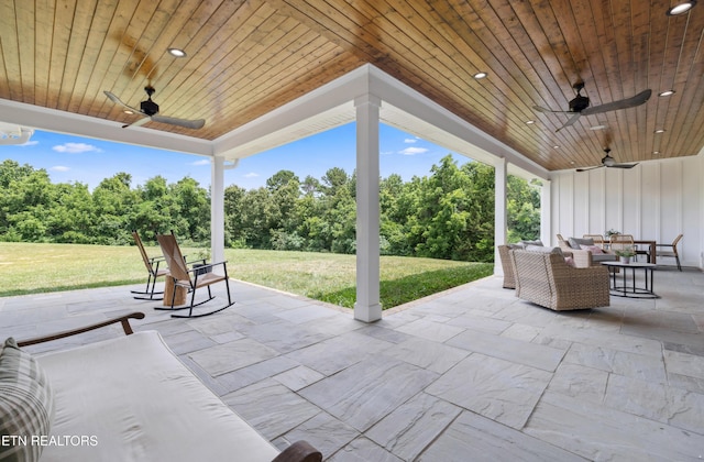 1014 High Springs Rd, Knoxville, TN 37932 - view of patio / terrace featuring a ceiling fan, an outdoor living space, and view of scattered trees