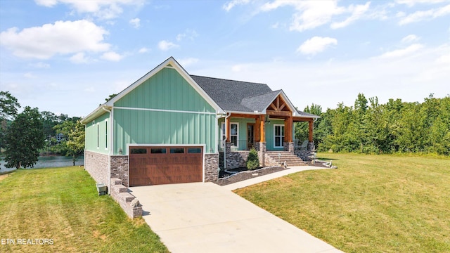 487 Peninsula, Rutledge, TN 37861 - view of front of property featuring board and batten siding, covered porch, a front yard, and driveway