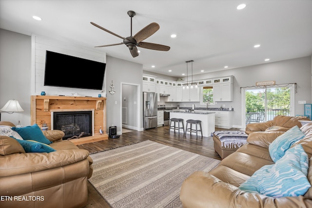 487 Peninsula, Rutledge, TN 37861 - living area with dark wood-style floors, recessed lighting, ceiling fan, and a large fireplace