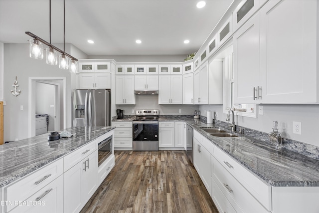 487 Peninsula, Rutledge, TN 37861 - kitchen with appliances with stainless steel finishes, under cabinet range hood, white cabinets, recessed lighting, and dark stone countertops