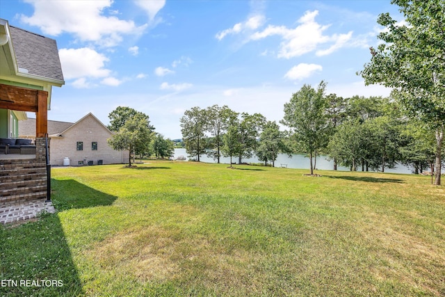 487 Peninsula, Rutledge, TN 37861 - view of green lawn featuring a water view