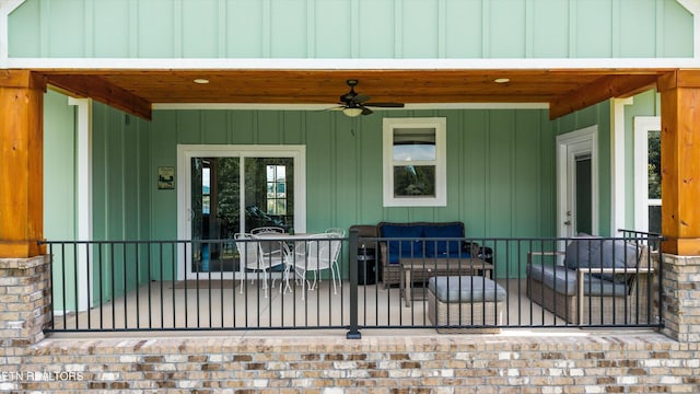 487 Peninsula, Rutledge, TN 37861 - entrance to property with a ceiling fan, outdoor lounge area, board and batten siding, and a patio