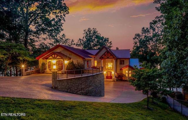 311 Deerwood Ln, Lafollette, TN 37766 - view of front of home with driveway, a metal roof, and a standing seam roof