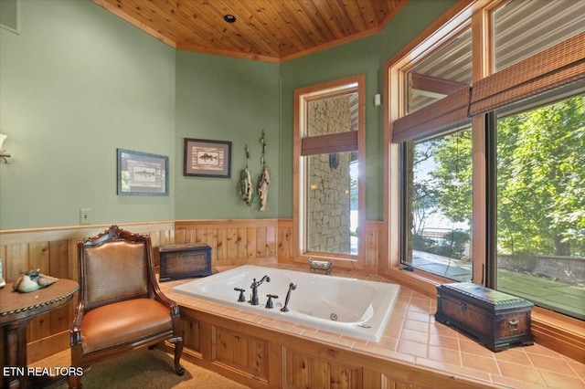 311 Deerwood Ln, Lafollette, TN 37766 - bathroom featuring plenty of natural light, ornamental molding, a wainscoted wall, a whirlpool tub, and wood ceiling