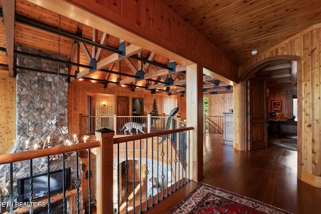 311 Deerwood Ln, Lafollette, TN 37766 - hall with wood walls, wood finished floors, wooden ceiling, an upstairs landing, and lofted ceiling