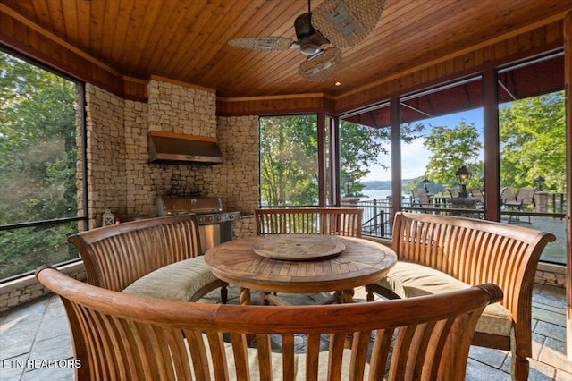 311 Deerwood Ln, Lafollette, TN 37766 - sunroom / solarium featuring ceiling fan, outdoor dining space, an outdoor kitchen, and a water view