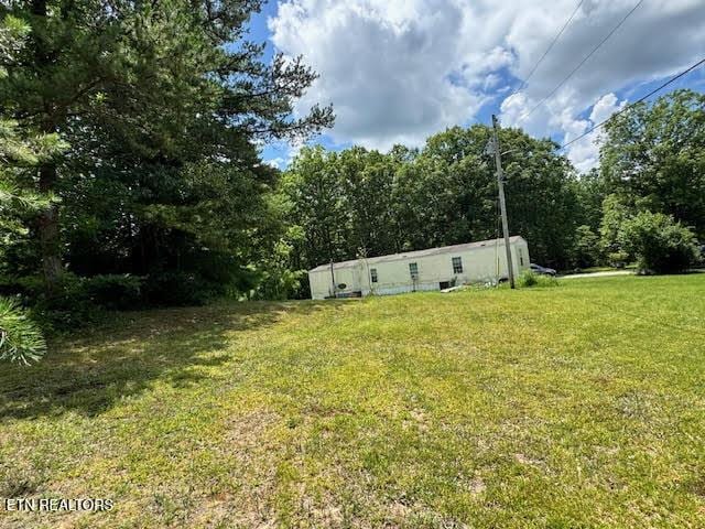 1101 Franklin Loop, Clarkrange, TN 38553 - view of green lawn