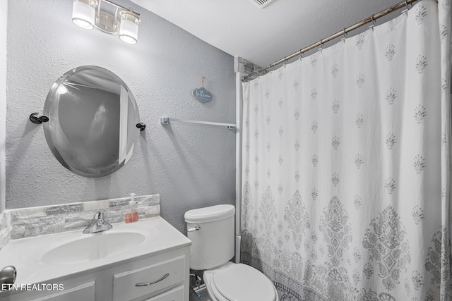 121 N Niota Rd, Englewood, TN 37329 - bathroom with vanity, a textured wall, and a shower with curtain