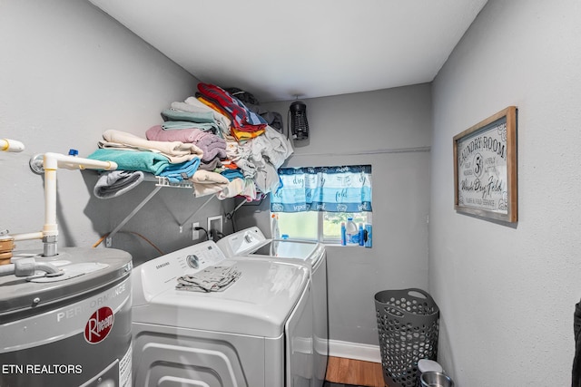 121 N Niota Rd, Englewood, TN 37329 - washroom featuring water heater, washing machine and dryer, and wood finished floors