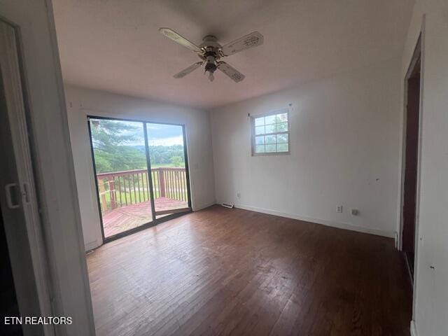 114 Red Cedar Rd, Lafollette, TN 37766 - empty room with wood finished floors and a ceiling fan