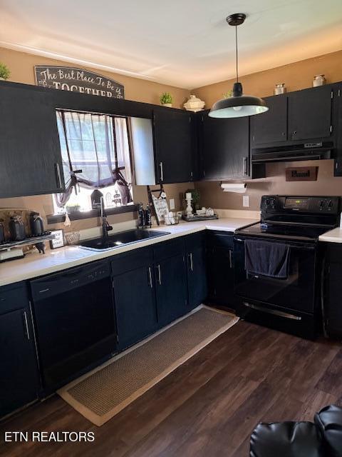 122 Regan Ln, Lafollette, TN 37766 - kitchen with black appliances, extractor fan, dark cabinets, and light countertops