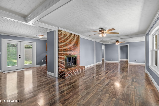 221 Greer Ln, Tazewell, TN 37879 - unfurnished living room with a ceiling fan, a textured ceiling, hardwood / wood-style flooring, french doors, and ornamental molding