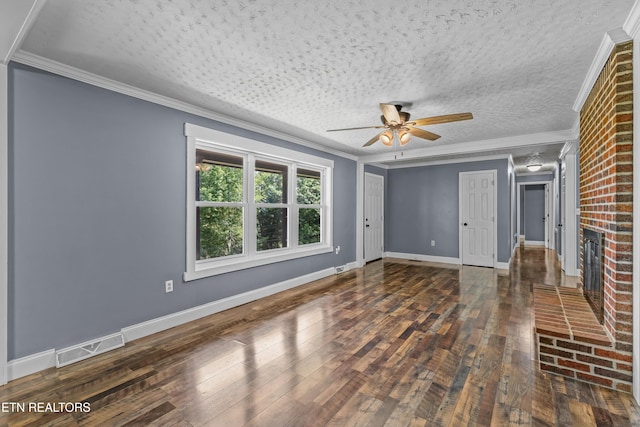 221 Greer Ln, Tazewell, TN 37879 - unfurnished living room with ceiling fan, hardwood / wood-style flooring, crown molding, a fireplace, and a textured ceiling