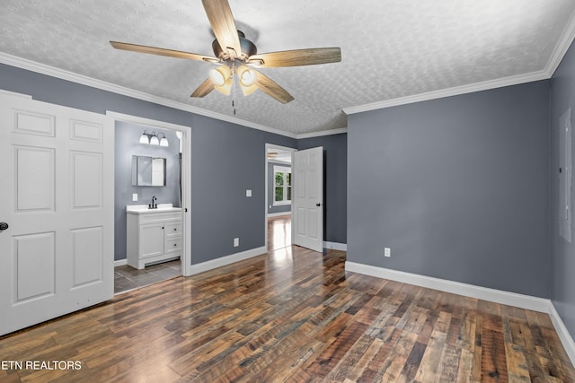 221 Greer Ln, Tazewell, TN 37879 - unfurnished bedroom with wood finished floors, a textured ceiling, ensuite bathroom, and a ceiling fan
