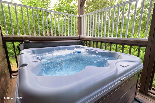 1130 Sharp Rd, Sevierville, TN 37876 - wooden terrace featuring a hot tub