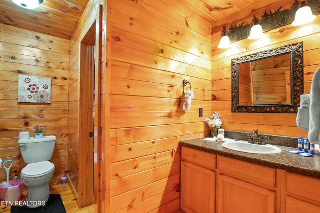 1130 Sharp Rd, Sevierville, TN 37876 - bathroom with wooden walls, wooden ceiling, and vanity