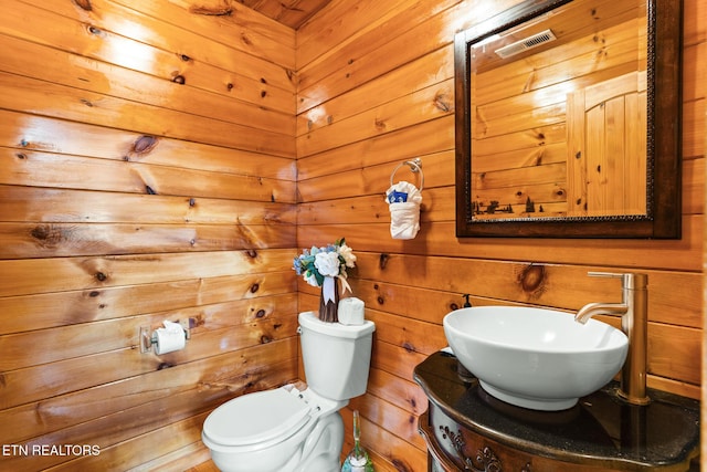 1130 Sharp Rd, Sevierville, TN 37876 - half bath with wood walls and vanity