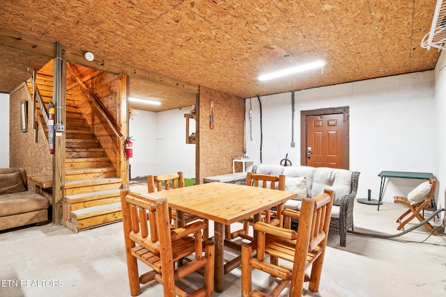 1130 Sharp Rd, Sevierville, TN 37876 - dining area with concrete flooring and stairway
