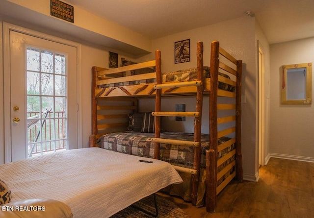 537 Johnson Ln Unit 1 & 2, Gatlinburg, TN 37738 - bedroom featuring wood finished floors and access to exterior