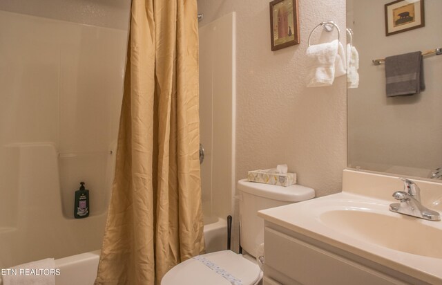 537 Johnson Ln Unit 1 & 2, Gatlinburg, TN 37738 - full bathroom with shower / tub combo, vanity, and a textured wall
