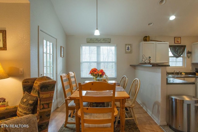 537 Johnson Ln Unit 1 & 2, Gatlinburg, TN 37738 - dining room featuring light wood finished floors, vaulted ceiling, and recessed lighting