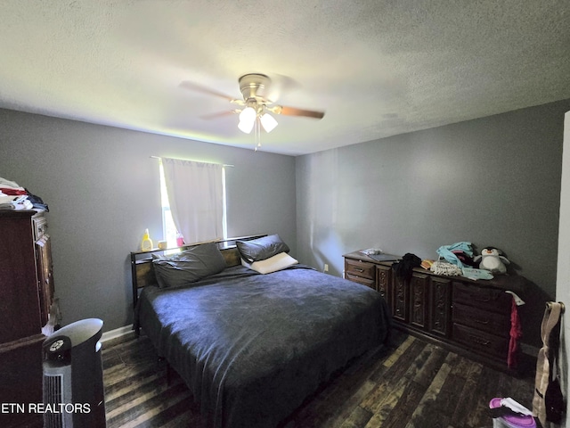 855 N Ridgecrest Rd, Luttrell, TN 37779 - bedroom featuring dark wood-type flooring, a ceiling fan, and a textured ceiling