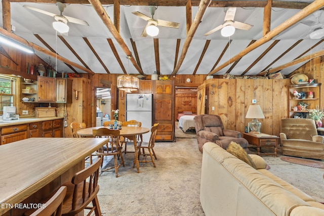 2255 Citico Rd, Vonore, TN 37885 - living room with a ceiling fan, light colored carpet, and wooden walls