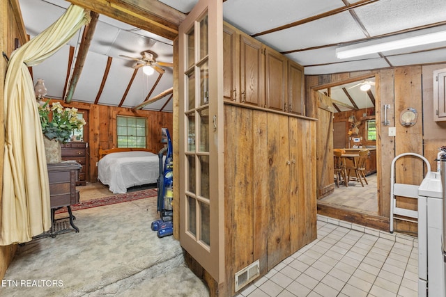 2255 Citico Rd, Vonore, TN 37885 - bedroom featuring wood walls and multiple windows