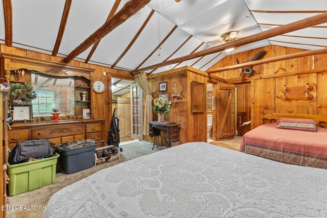 2255 Citico Rd, Vonore, TN 37885 - bedroom featuring wood walls, vaulted ceiling, and carpet floors