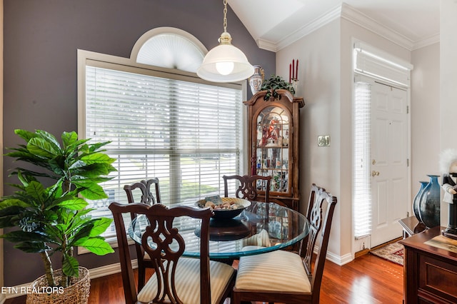 614 Chapel Point Ln, Knoxville, TN 37934 - dining area with wood finished floors, vaulted ceiling, and ornamental molding