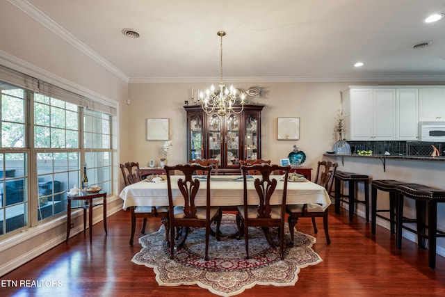 614 Chapel Point Ln, Knoxville, TN 37934 - dining room featuring a chandelier, dark wood finished floors, ornamental molding, and recessed lighting