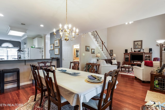 614 Chapel Point Ln, Knoxville, TN 37934 - dining space featuring dark wood-style floors, stairs, a chandelier, and recessed lighting