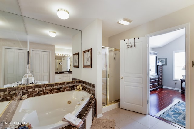 614 Chapel Point Ln, Knoxville, TN 37934 - full bathroom featuring a jetted tub, a stall shower, tile patterned flooring, and vanity