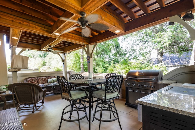 614 Chapel Point Ln, Knoxville, TN 37934 - view of patio with exterior kitchen, ceiling fan, an outdoor living space, and outdoor dining area