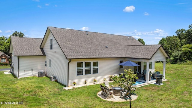 140 Walelu Trl, Vonore, TN 37885 - back of property with a patio area, a lawn, an outdoor fire pit, and roof with shingles