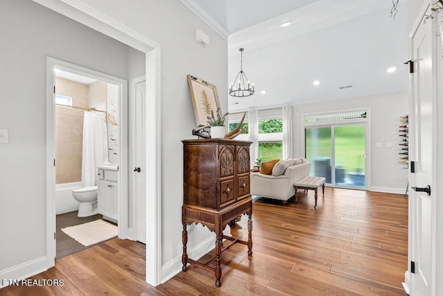 140 Walelu Trl, Vonore, TN 37885 - hall featuring wood-type flooring, a chandelier, ornamental molding, and recessed lighting
