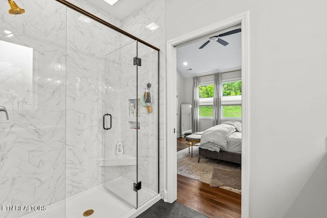 140 Walelu Trl, Vonore, TN 37885 - bathroom featuring a marble finish shower, ensuite bathroom, ceiling fan, and wood finished floors