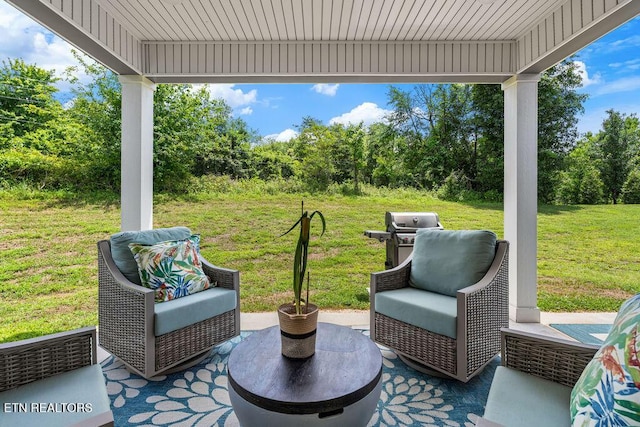 140 Walelu Trl, Vonore, TN 37885 - view of patio / terrace with view of scattered trees and area for grilling