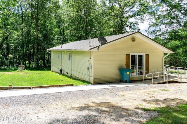 1010 Smallwood Rd, Jamestown, TN 38556 - view of property exterior with a lawn and a metal roof
