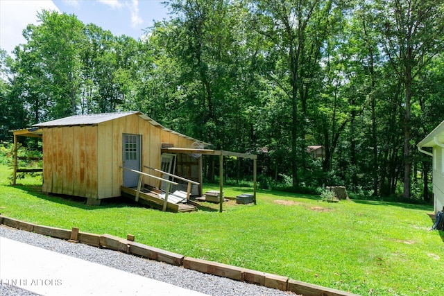 1010 Smallwood Rd, Jamestown, TN 38556 - view of green lawn featuring an outdoor structure