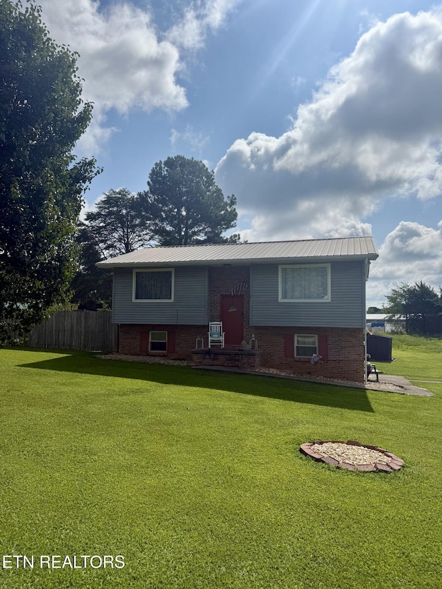 200 Sequoyah Dr, Madisonville, TN 37354 - raised ranch featuring brick siding and a metal roof
